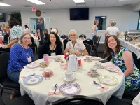 women around a table