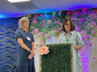 two women on stage