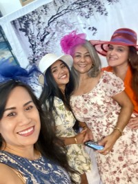 a small group shot of ladies at tea time